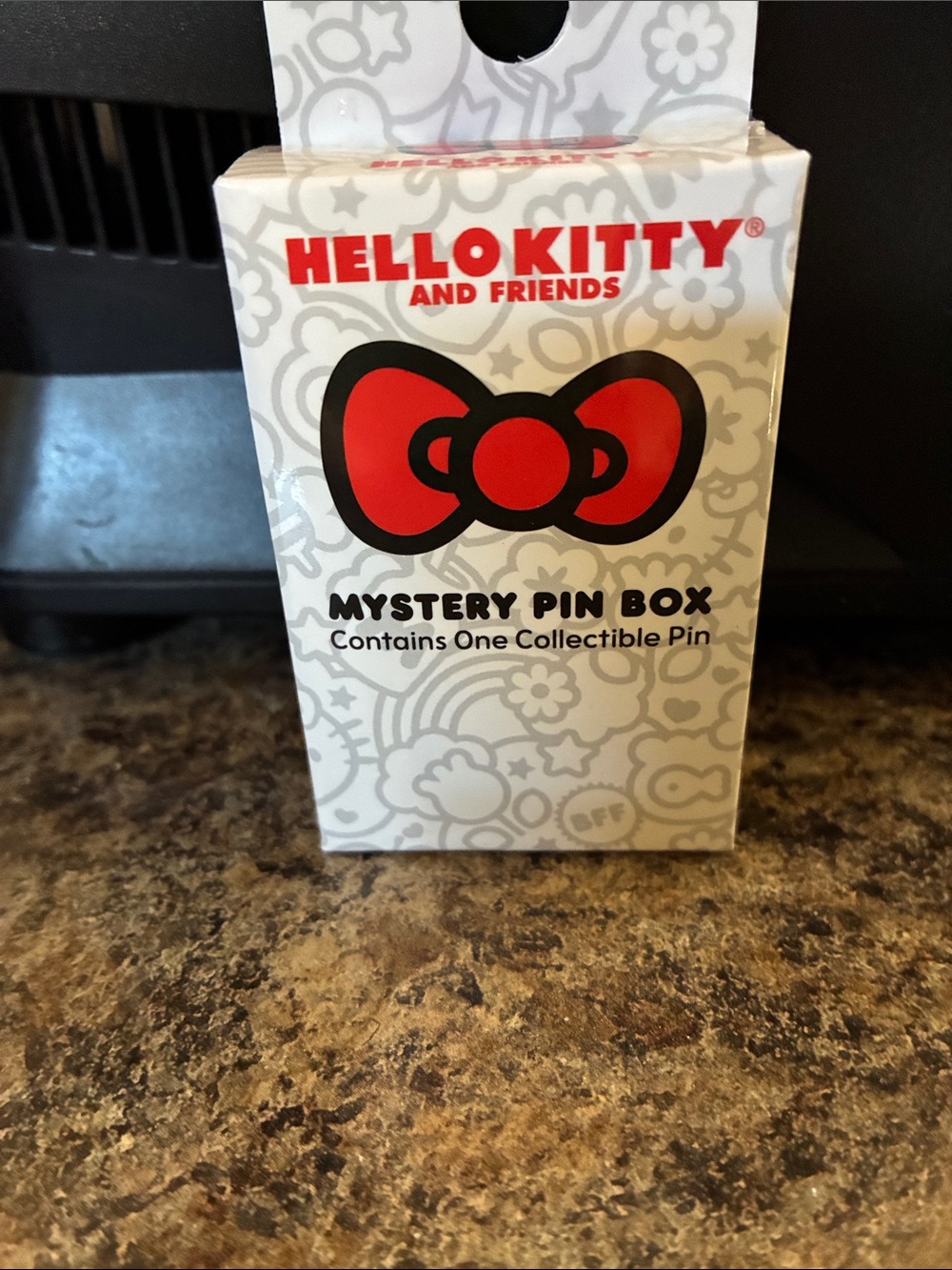 Hello Kitty White Box comes with a mystery pin inside